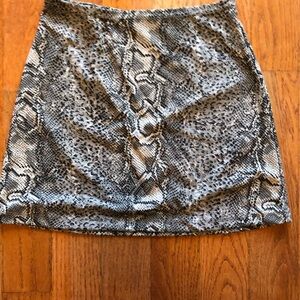 Vintage 90’s snake skin print mini skirt.